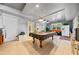 Basement game room with pool table and comfortable seating area at 125 Hillcrest Trce, Fayetteville, GA 30215