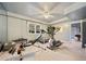 Well equipped home gym featuring cardio and weight training equipment at 125 Hillcrest Trce, Fayetteville, GA 30215