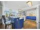 Kitchen boasts blue cabinets, white countertops, and an island at 125 Hillcrest Trce, Fayetteville, GA 30215