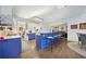 Eat-in kitchen with blue cabinets, island, and breakfast bar at 125 Hillcrest Trce, Fayetteville, GA 30215