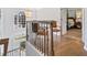 Upstairs landing with two chairs and hardwood floors at 125 Hillcrest Trce, Fayetteville, GA 30215