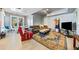 Open concept living room with comfortable seating and a large TV at 125 Hillcrest Trce, Fayetteville, GA 30215