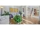 Comfortable living room features hardwood floors, neutral decor, and a seamless flow to the staircase at 125 Hillcrest Trce, Fayetteville, GA 30215