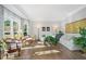 Inviting living room with hardwood floors, large windows, and elegant decor providing a bright atmosphere at 125 Hillcrest Trce, Fayetteville, GA 30215
