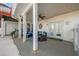 Covered patio with comfortable seating and French doors leading inside at 125 Hillcrest Trce, Fayetteville, GA 30215