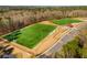 Turf sports fields with parking and clubhouse at 5101 Chesterfield Ln, Dunwoody, GA 30338