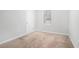 Simple bedroom with neutral carpeting and a window at 5632 Rock Springs Rd, Lithonia, GA 30038