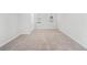 Spacious bedroom with neutral carpeting and ample natural light at 5632 Rock Springs Rd, Lithonia, GA 30038