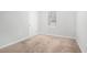 Bright bedroom with neutral carpeting and window at 5632 Rock Springs Rd, Lithonia, GA 30038