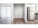 Laundry closet with shelving and vinyl flooring at 5632 Rock Springs Rd, Lithonia, GA 30038