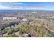 Aerial view of home, showcasing its location near reservoir and country club at 1608 Woodcliff Ne Dr, Atlanta, GA 30350