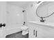 Clean bathroom with white subway tile and hexagon floor tile at 1608 Woodcliff Ne Dr, Atlanta, GA 30350