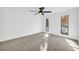 Bright bedroom with neutral carpeting and large windows at 1608 Woodcliff Ne Dr, Atlanta, GA 30350