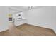 Modern dining area with kitchen and hardwood floors at 1608 Woodcliff Ne Dr, Atlanta, GA 30350