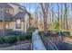 Condo building exterior showcasing a walkway and landscaping at 1608 Woodcliff Ne Dr, Atlanta, GA 30350