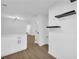 Laundry room with white cabinets and hardwood floors at 1608 Woodcliff Ne Dr, Atlanta, GA 30350