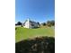 Large backyard featuring lush green grass, offering a peaceful and private outdoor retreat at 575 Dunagan Dr, Lawrenceville, GA 30045
