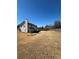 View of a spacious backyard with a fence at 575 Dunagan Dr, Lawrenceville, GA 30045