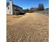 Expansive, dry backyard with a wooden fence, ideal for creating a private outdoor oasis at 575 Dunagan Dr, Lawrenceville, GA 30045