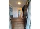 Bright foyer with hardwood floors, a staircase, and a view into the living spaces at 575 Dunagan Dr, Lawrenceville, GA 30045