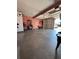 Spacious garage with overhead lighting and ample room for parking and storage at 575 Dunagan Dr, Lawrenceville, GA 30045