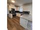 Bright kitchen featuring stainless steel appliances, granite countertops, and window at 575 Dunagan Dr, Lawrenceville, GA 30045