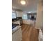 Kitchen with stainless steel appliances and granite countertops overlooking living area at 575 Dunagan Dr, Lawrenceville, GA 30045