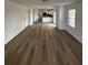 Spacious open concept living area featuring stylish hardwood floors and natural light at 575 Dunagan Dr, Lawrenceville, GA 30045