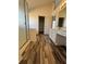 Main bathroom with a glass shower, double sinks and hardwood floors at 575 Dunagan Dr, Lawrenceville, GA 30045