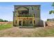New construction home with a brick and siding exterior and a covered wooden porch overlooking the yard at 4002 Adler Cir, Buford, GA 30519