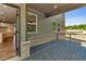 A view from the cozy covered back porch with a railing, great for relaxing outdoors at 4002 Adler Cir, Buford, GA 30519