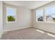Bright bedroom with large window and neutral carpet at 4002 Adler Cir, Buford, GA 30519