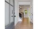 Welcoming foyer featuring light wood floors and open access to the home's living spaces at 4002 Adler Cir, Buford, GA 30519