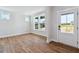 Bright living room with hardwood floors and ample natural light, offering a cozy and inviting atmosphere at 4002 Adler Cir, Buford, GA 30519