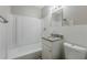 Clean bathroom with granite countertop, white vanity, and shower/tub combo at 905 Fairburn Nw Rd, Atlanta, GA 30331