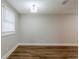 Simple dining room with wood flooring and neutral walls at 905 Fairburn Nw Rd, Atlanta, GA 30331