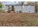 Brick house with wooden deck and AC unit in the back at 905 Fairburn Nw Rd, Atlanta, GA 30331
