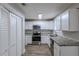 Newly renovated kitchen featuring granite countertops and stainless steel appliances at 905 Fairburn Nw Rd, Atlanta, GA 30331