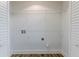 Laundry closet with wire shelving and connections for washer/dryer at 905 Fairburn Nw Rd, Atlanta, GA 30331