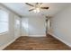 Spacious living room with ceiling fan and wood-look floors at 905 Fairburn Nw Rd, Atlanta, GA 30331