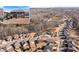 Community overview showcasing houses, lake, and surrounding landscape at 5915 Partners Pass, Cumming, GA 30028