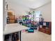 Bonus room with large countertop, storage shelving, and lots of available space at 5915 Partners Pass, Cumming, GA 30028