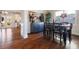Elegant dining area featuring hardwood flooring and stylish decor at 5915 Partners Pass, Cumming, GA 30028