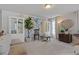 Neutral seating area features built-in display cabinets and stylish decor at 5915 Partners Pass, Cumming, GA 30028