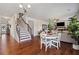 Inviting interior showcasing hardwood floors, staircase, and cozy living area at 5915 Partners Pass, Cumming, GA 30028