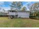 House exterior with a deck and fenced yard at 2098 Mallard Crst, Lithonia, GA 30058