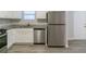 Kitchen with stainless steel appliances and white cabinets at 2098 Mallard Crst, Lithonia, GA 30058