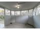 Empty screened porch with white walls and wood floors at 2098 Mallard Crst, Lithonia, GA 30058