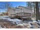 Large deck overlooks a partially snow covered backyard at 2751 Lloyd Rd, Decatur, GA 30034