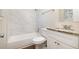 Updated bathroom with granite countertop and marble shower at 2751 Lloyd Rd, Decatur, GA 30034